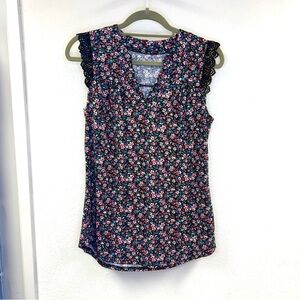 Women’s Bling Fit sleeveless floral V-neck blouse with lace caps, size Medium
